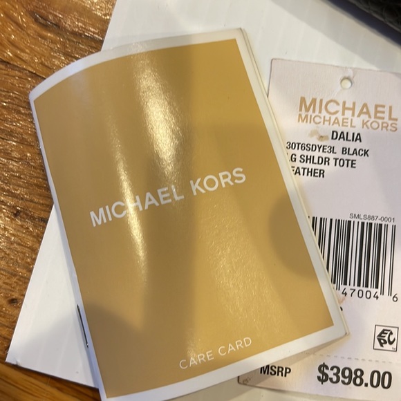 Micheal Kors Daliha Large Shoulder tote ( black). Knotted detail on sides. - Picture 6 of 7